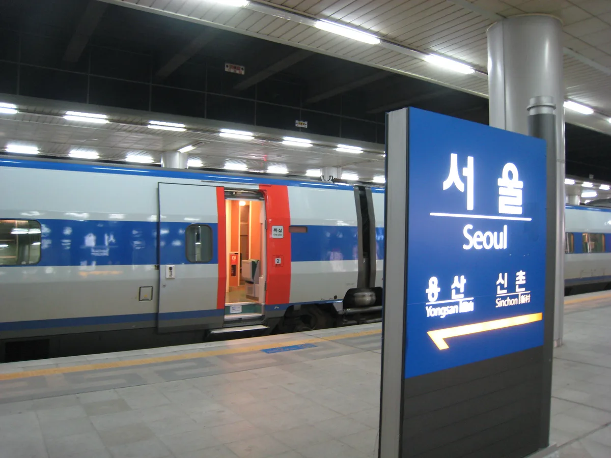 A KTX high-speed train at a station platform in Seoul.