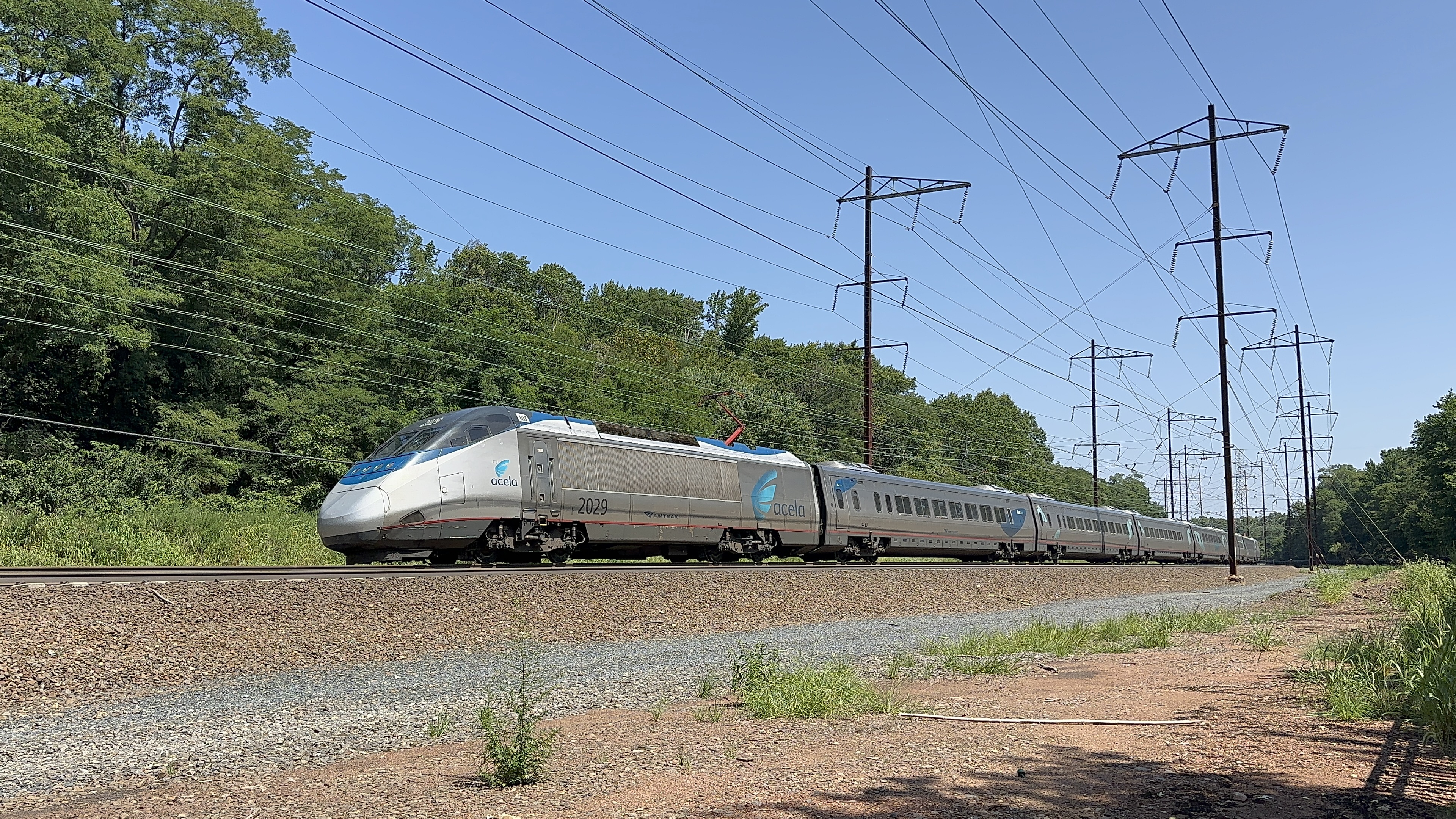 Amtrak Acela Train 2162 Passing By Oakland Park in Metuchen, NJ