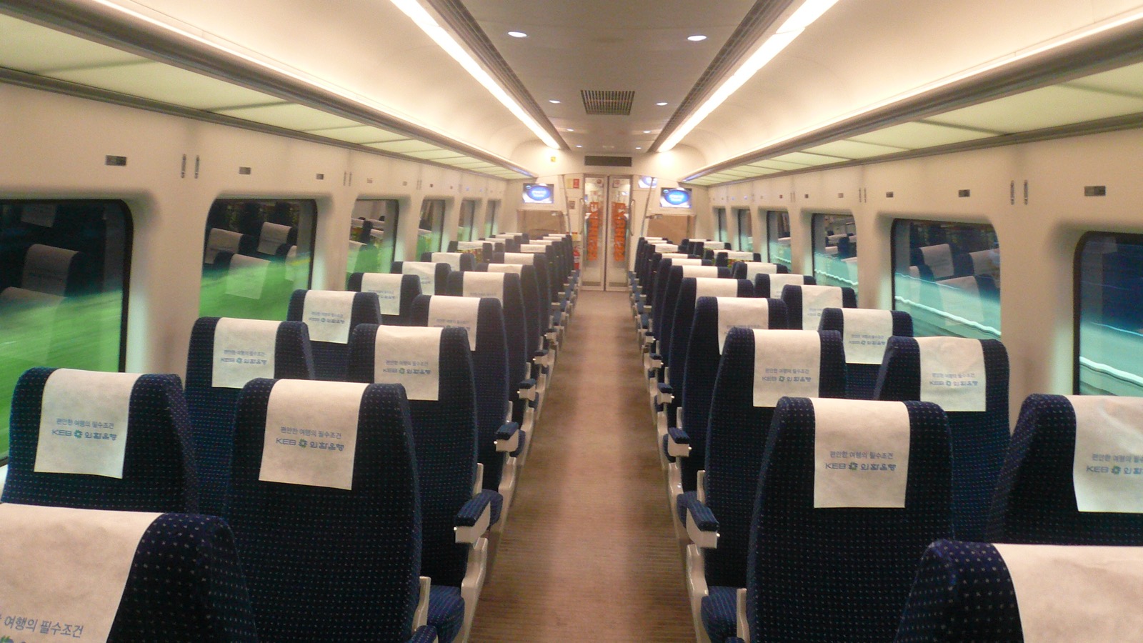 Interior of an AREX Airport Railroad Express train arriving from Incheon International Airport.