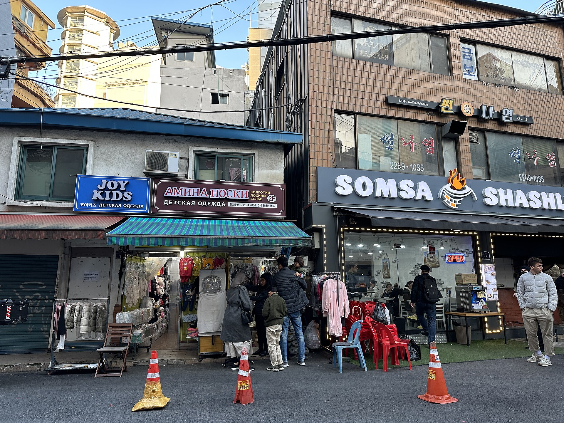 Various pictures of businesses in the district.