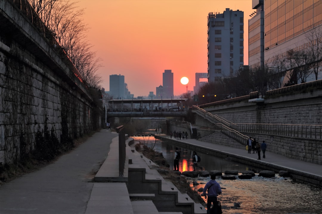 Sunset in Seoul along the Cheonggyecheon stream.