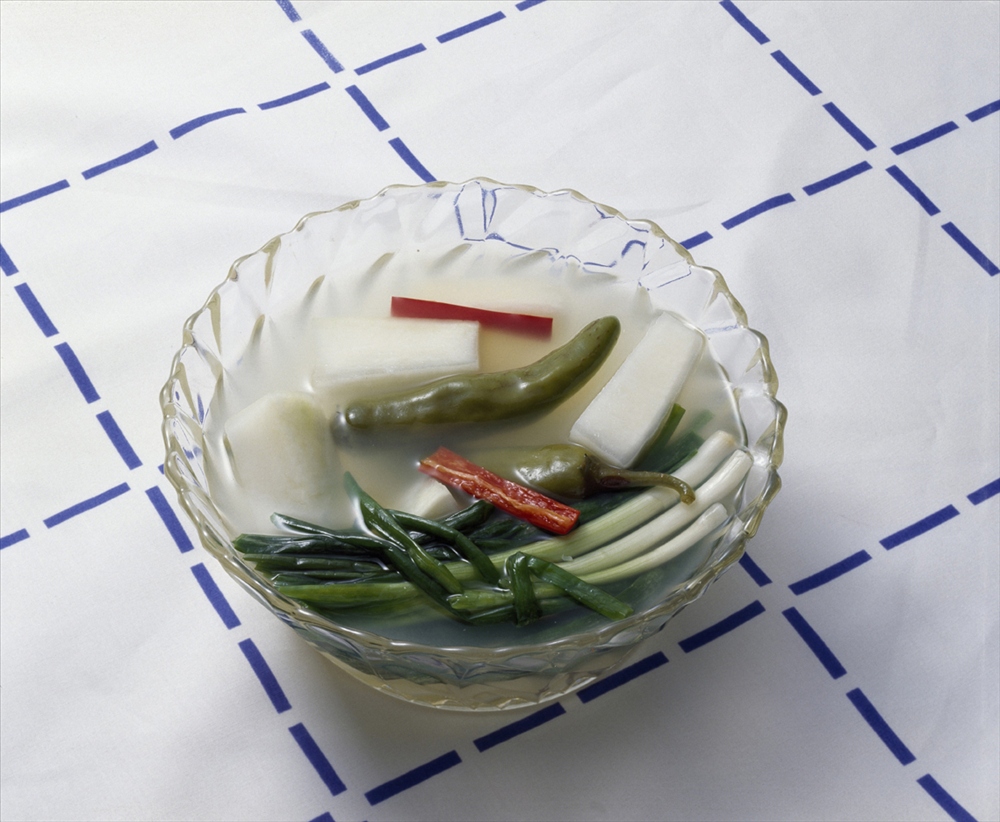 Dongchimi is another kind of kimchi which mainly consists of radish, cabbage, onions and peppers.