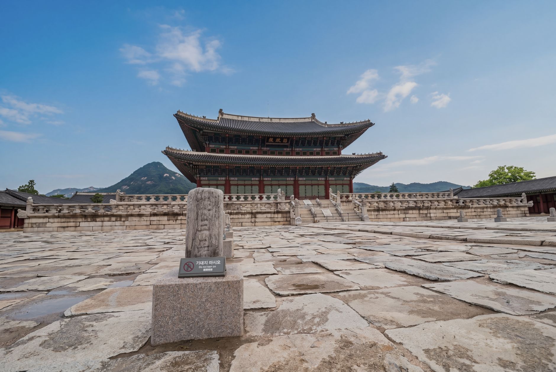 Stunning view of Gyeongbokgung Palace under a blue sky in Seoul, South Korea.