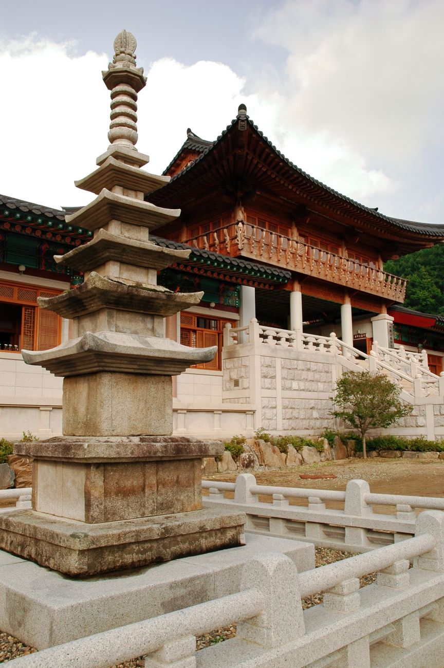 Stone pagoda and temple architecture at a historic site in Hapcheon, South Korea.