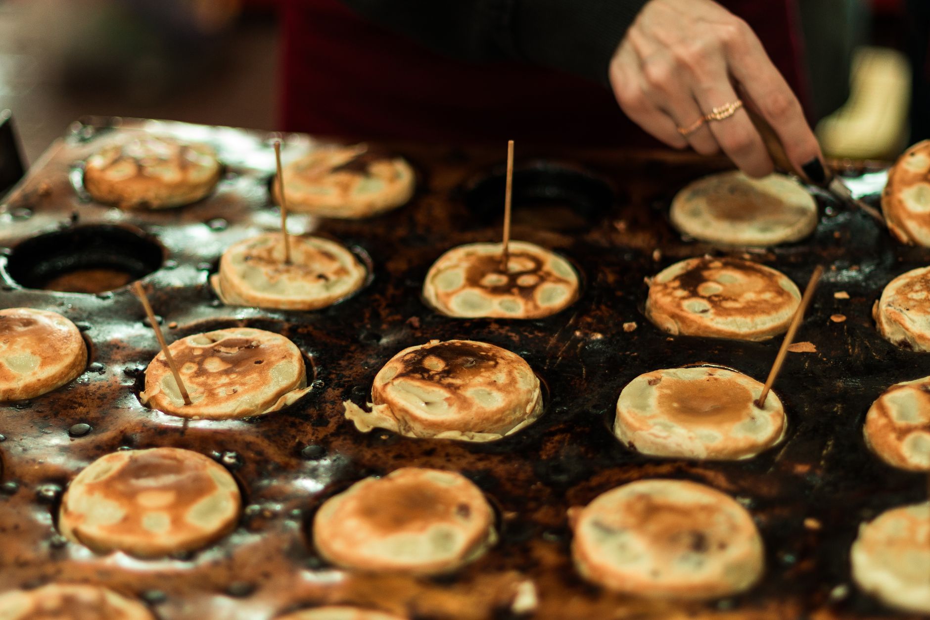 Delicious street food pancakes cooked fresh in São Paulo, Brazil, on a hot griddle.
