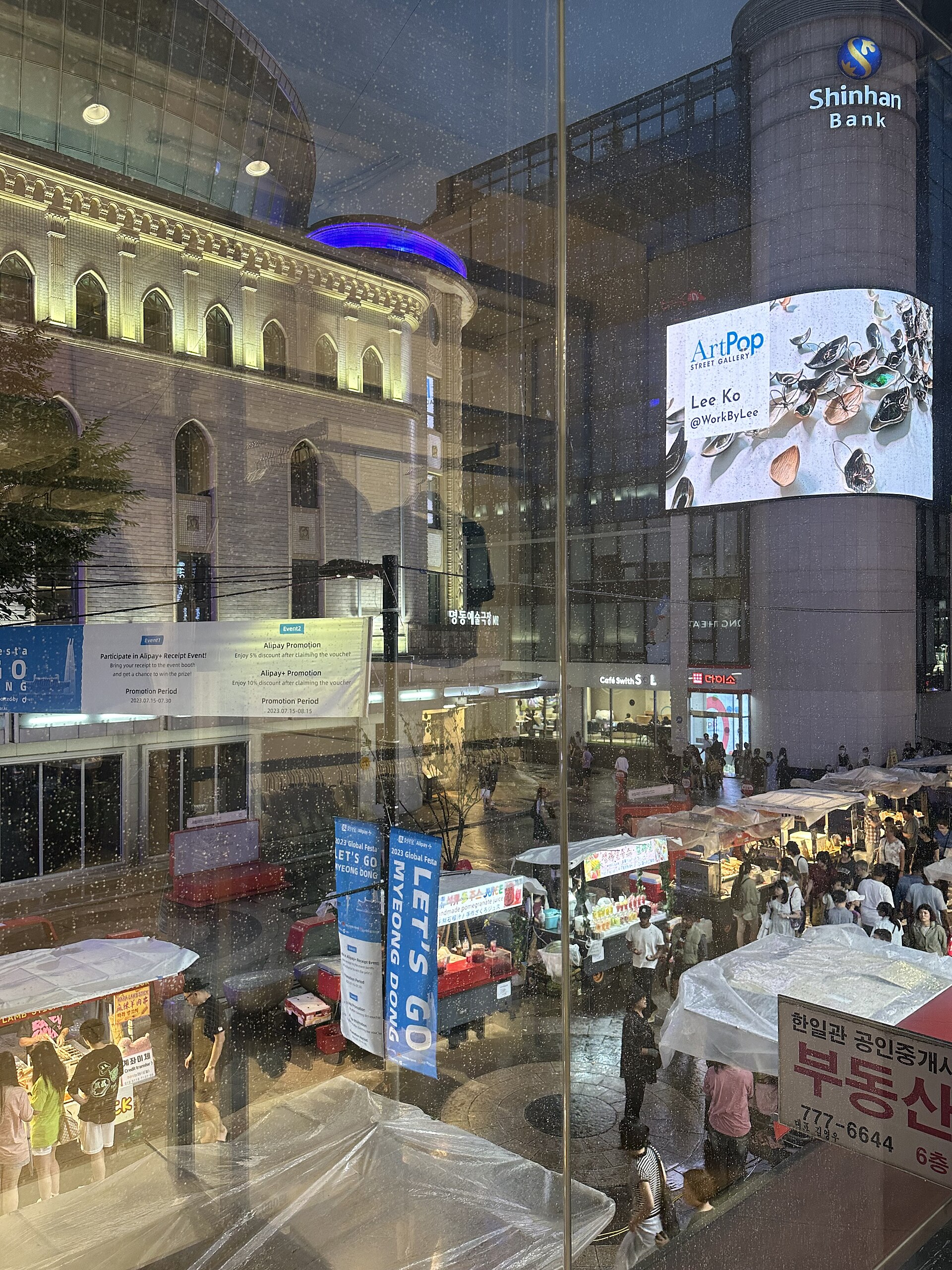 Digital billboard display featuring Lee Ko’s sculpture “A Way Coming Back” in Myeongdong, Seoul, South Korea.